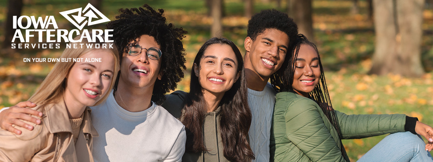 A group of teens smiling with the Iowa Aftercare logo superimposed above them